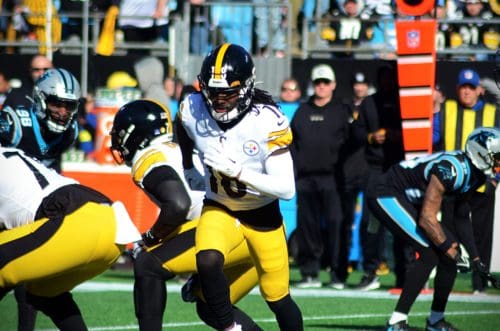 Diontae Johnson motions across the offense as the Steelers played against the Carolina Panthers on Sunday, Dec. 18, 2022 at Bank of America Stadium in Charlotte. (Mitchell Northam / Steelers Now)