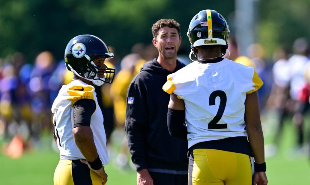 Pittsburgh Steelers quarterbacks Russel Wilson and Justin Fields with QB coach Tom Arth